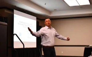 Adam Presenting at Alleginace in 2025 on The Affordability Crisis