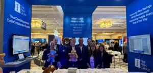 SIIA photo of Phia holding up Build a Bears