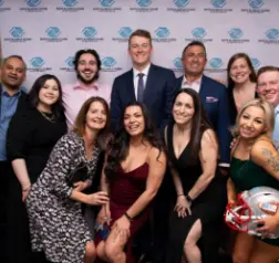 Phia employees taking photo at auction