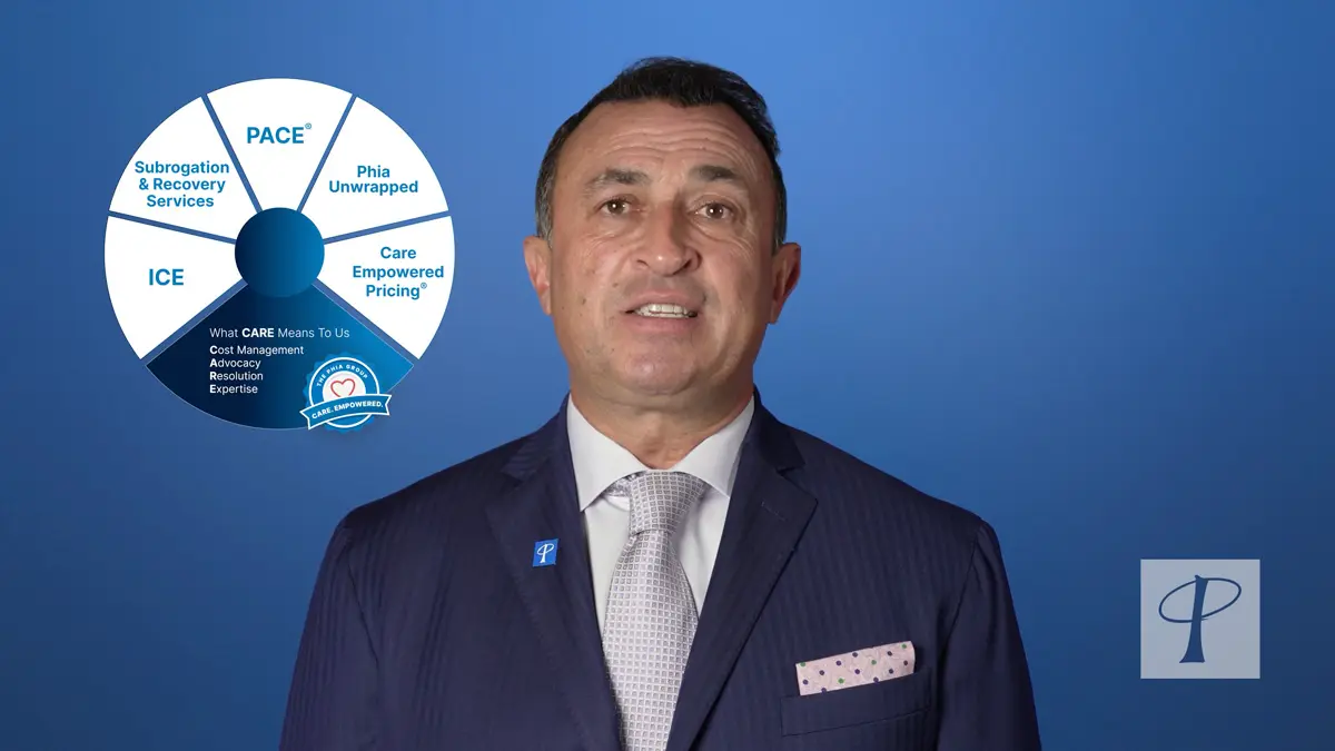 Adam Russo with Phia Services wheel. Thumbnail for Video